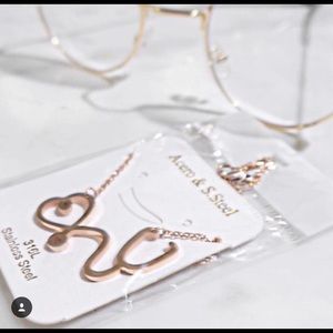 Stethoscope heart necklace 